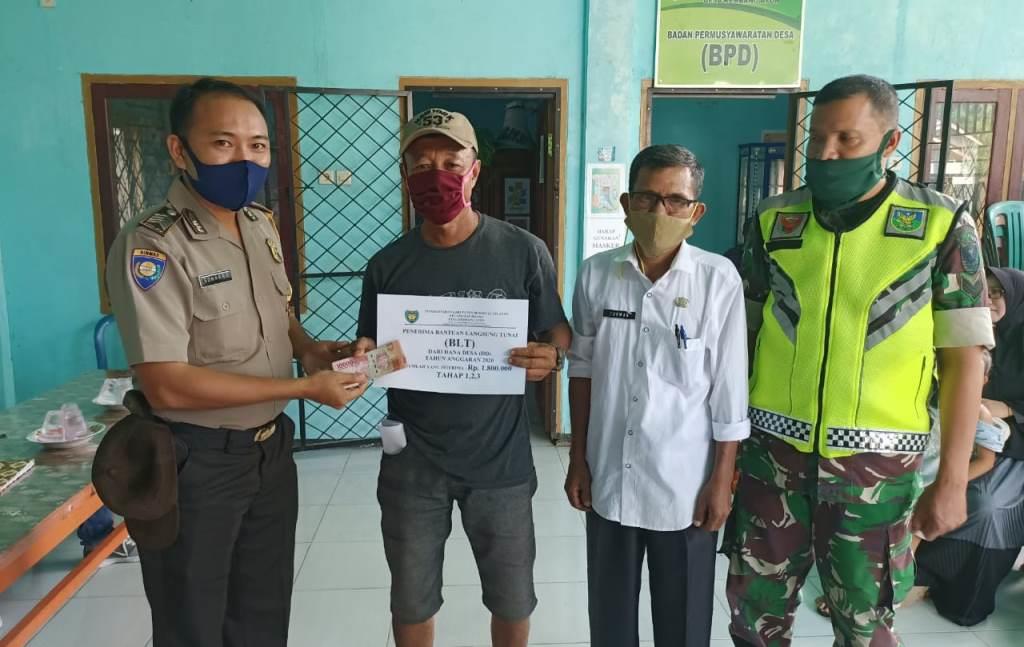 Polsek Seginim: Penyaluran BLT Kembang Ayun Sesuai Protokol Kesehatan COVID-19