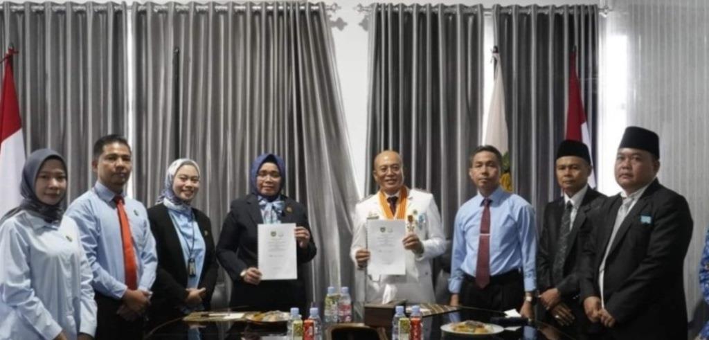 Bupati Gusnan dan Kejari Tandatangani MoU Kesepakatan Penanganan Hukum